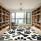Playful Black Paw and Bone Illustration Rug