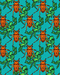 Orange Beetle Green Foliage Teal Background Rug