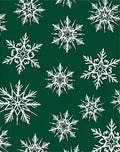 White Snowflake Pattern On Green Rug